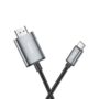 Hoco UA27 Type-C to HDTV cable connecting a laptop to a large screen monitor